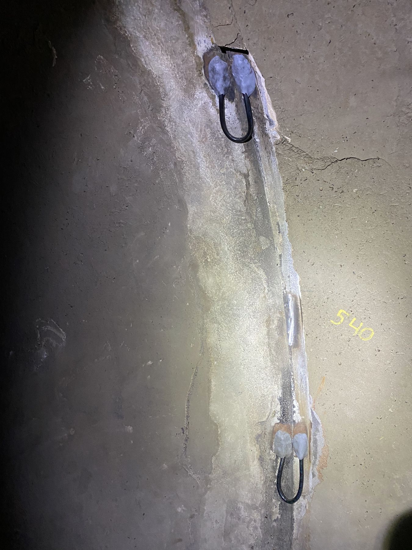 Wire loops sealed into a concrete wall at station 540